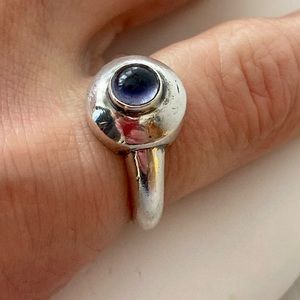 Round Sterling Silver Ring with Amethyst Stone.